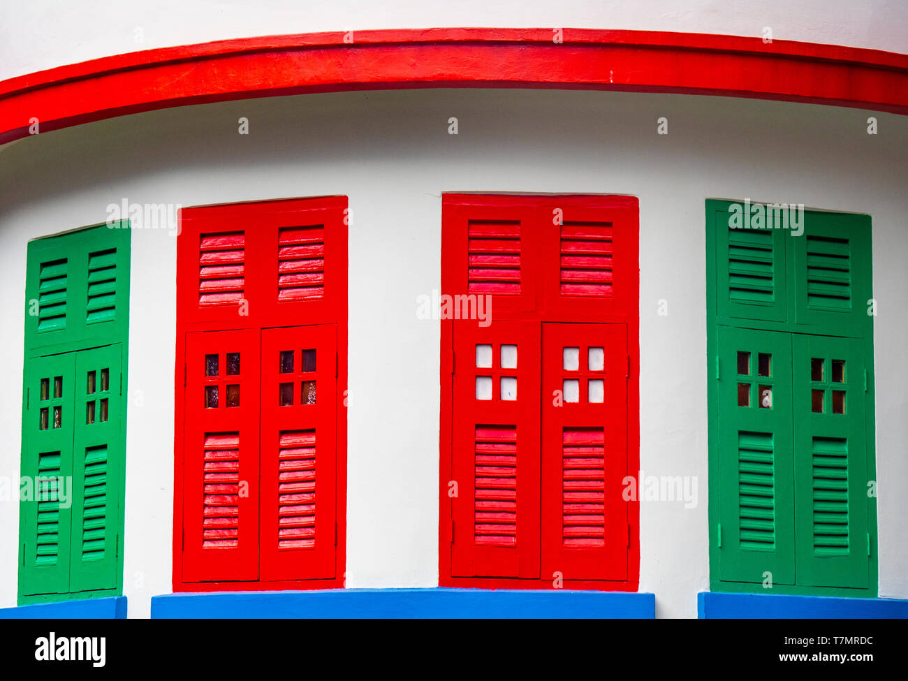 Brightly coloured window shutters of Selegie Arts Centre Bras Basah Singapore. Stock Photo