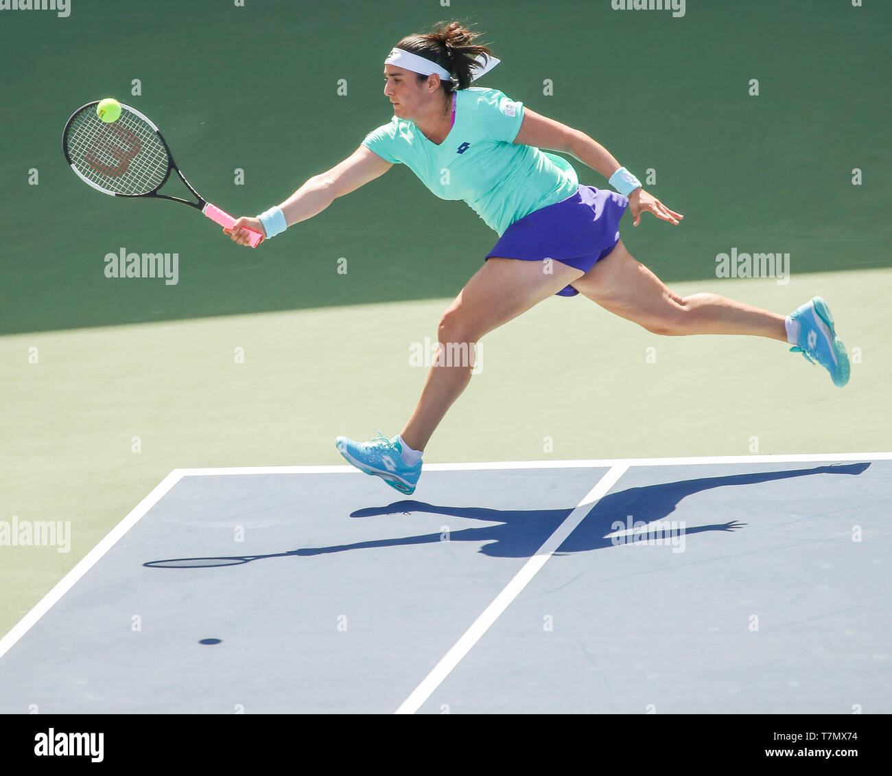 Tunisian  tennis player Ons Jabeurplaying forehand shot during Dubai Tennis Championships 2019, Dubai, United Arab Emirates Stock Photo
