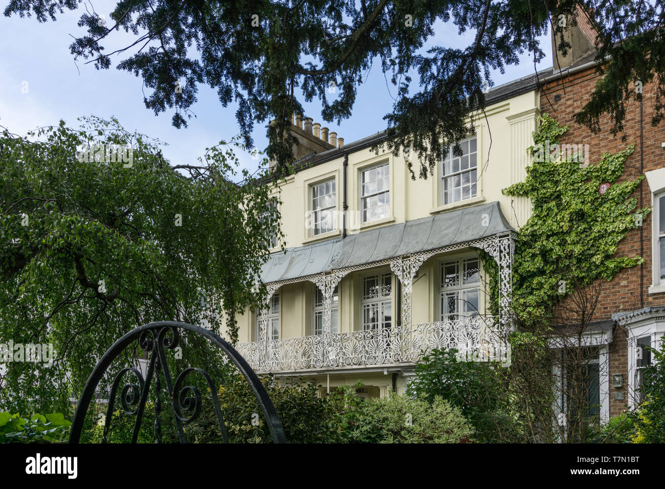Terraced period properties, built circa 1835, with fine cast iron verandas, Albion Place, Northampton, UK Stock Photo