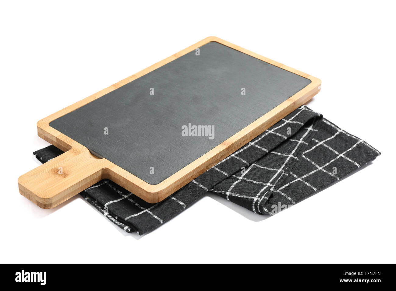 Cutting board with kitchen towel isolated on white background Stock Photo