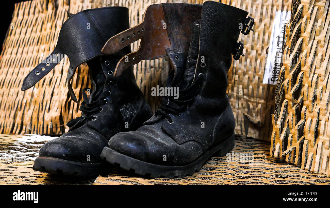 A pair of dirty Rangers, French military boots, Lyon, France Stock Photo -  Alamy