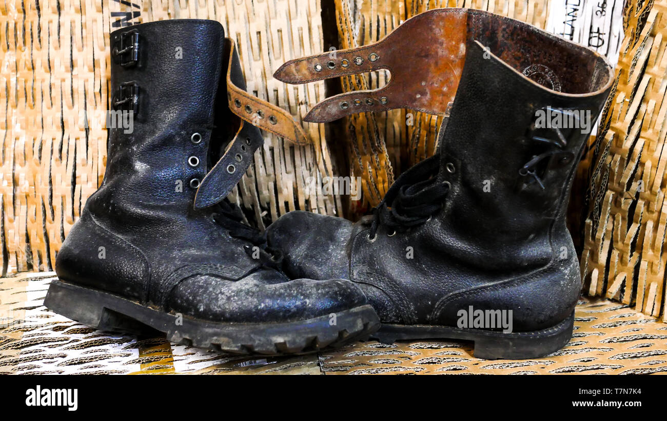 A pair of dirty Rangers, French military boots, Lyon, France Stock Photo -  Alamy
