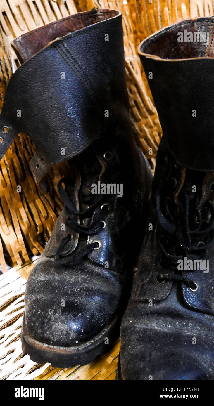 A pair of dirty Rangers, French military boots, Lyon, France Stock Photo -  Alamy