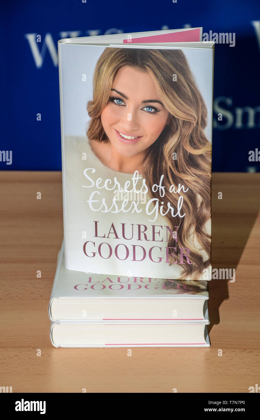 Book by Lauren Goodger 'Secrets of an Essex Girl' in Southend on Sea, Essex, UK. TOWIE, The Only Way Is Essex actress. Stack of books Stock Photo