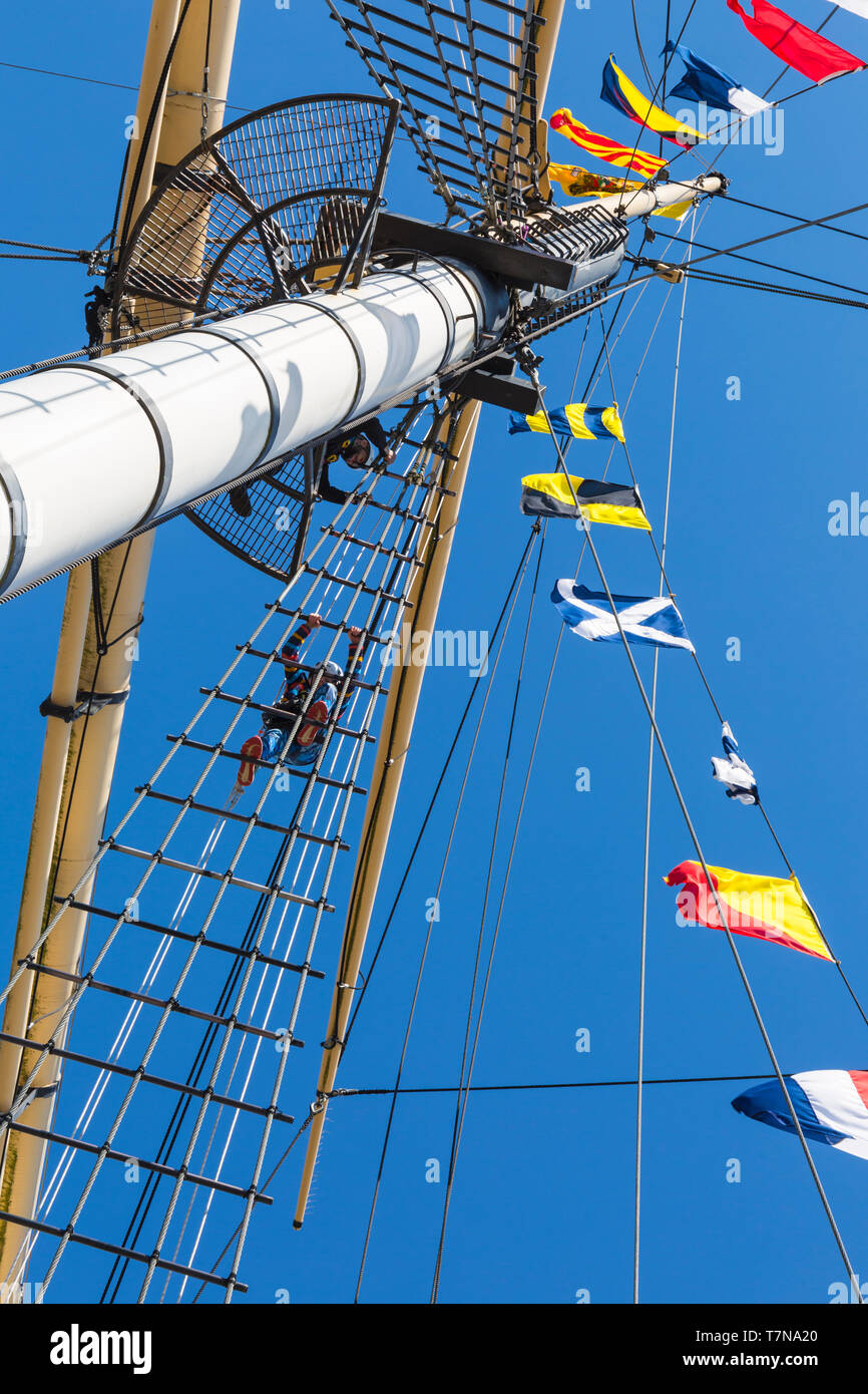 Boy climbing rigging of ss great britain hires stock photography and