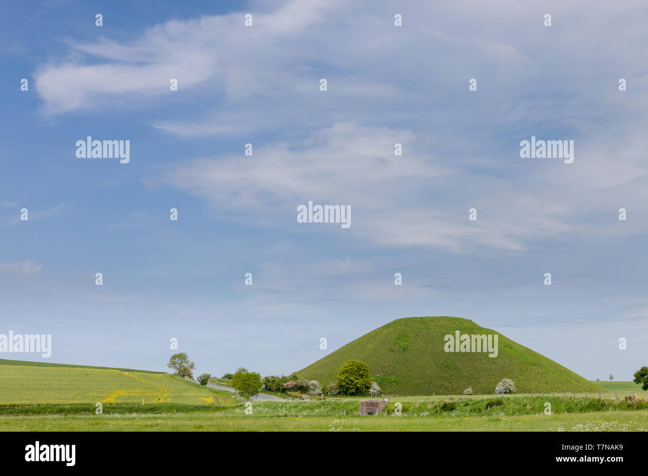 Silbury Hill is a prehistoric artificial chalk mound near Avebury in ...