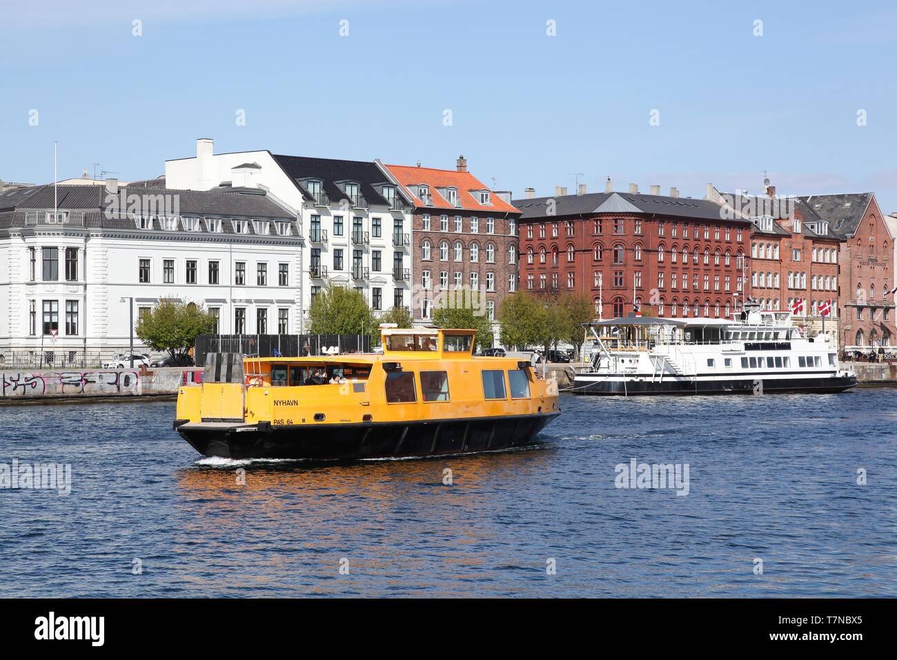 Copenhagen, Denmark - April 15, 2019: Yellow public transportation boat ...