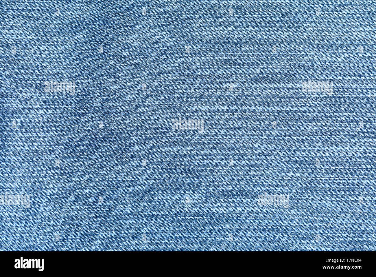 Texture of blue jeans as background, space for text Stock Photo