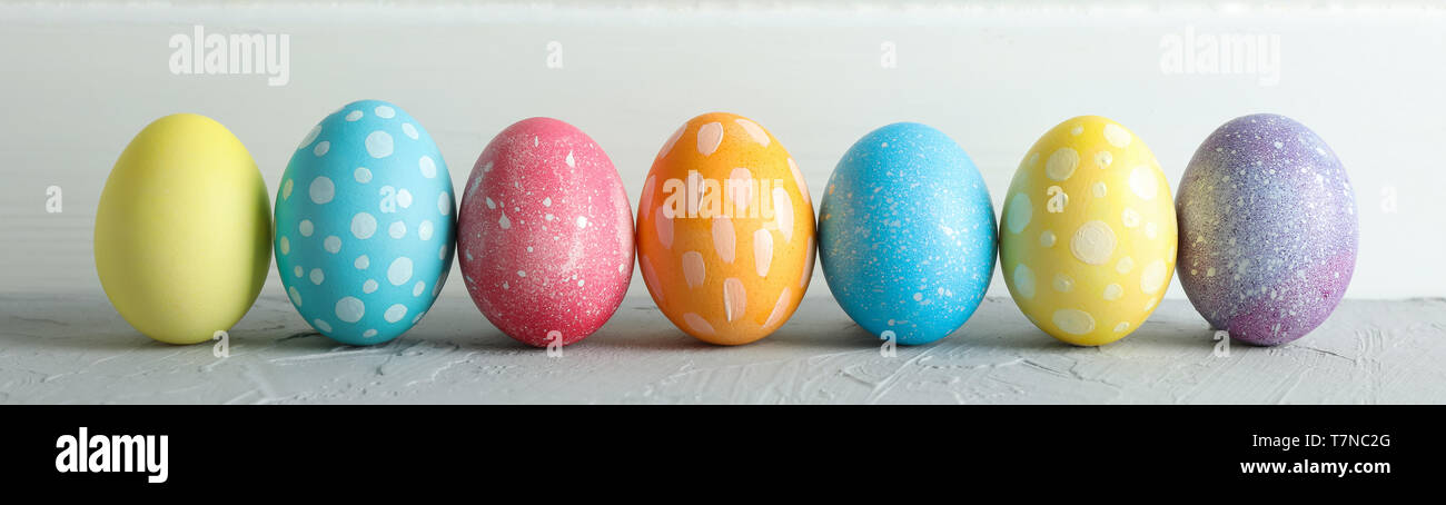 Decorated Easter eggs on color background, closeup. Space for text Stock Photo