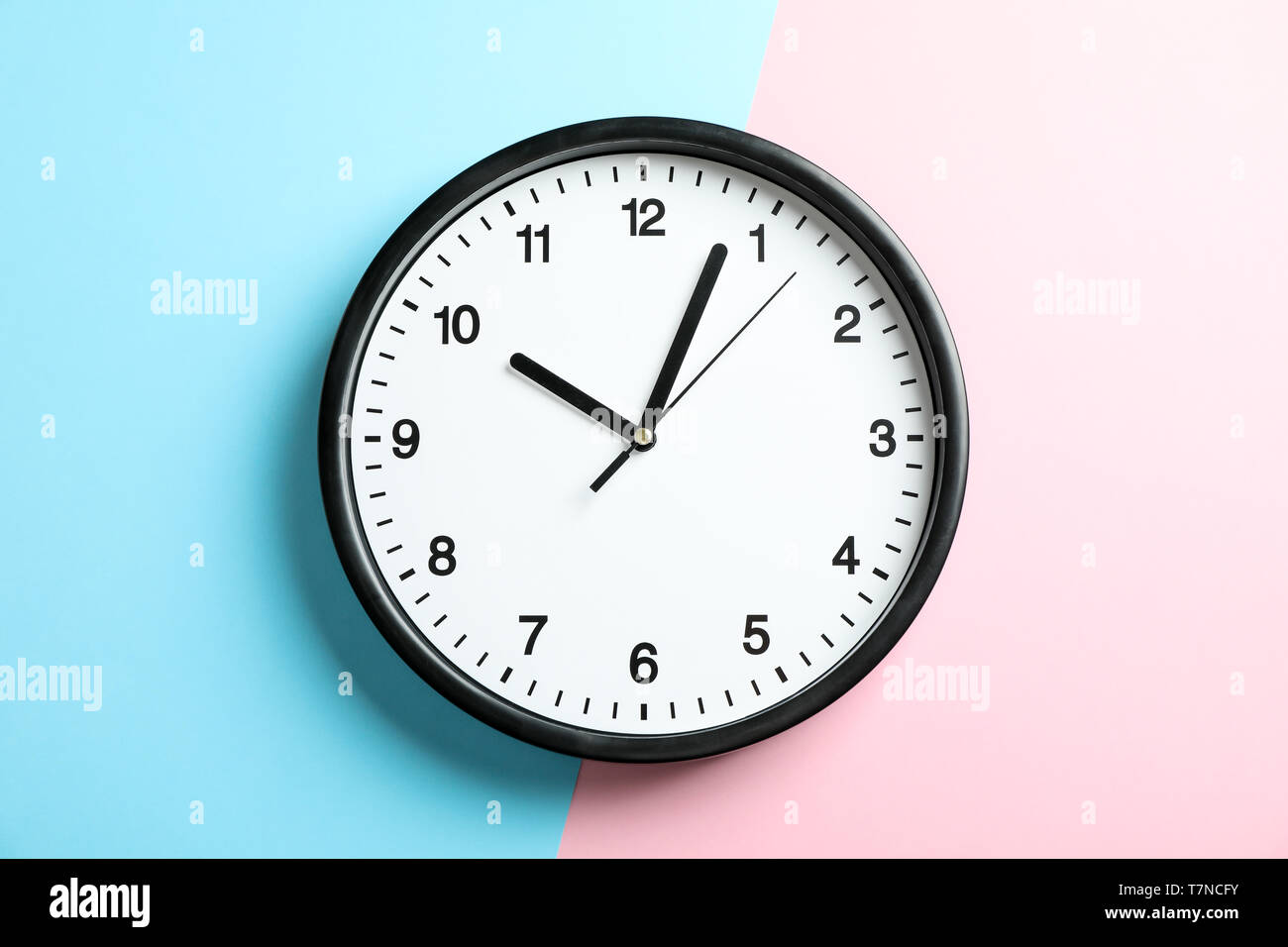Big Beautiful Office Clock On Two Tone Solid Color Pink And Light