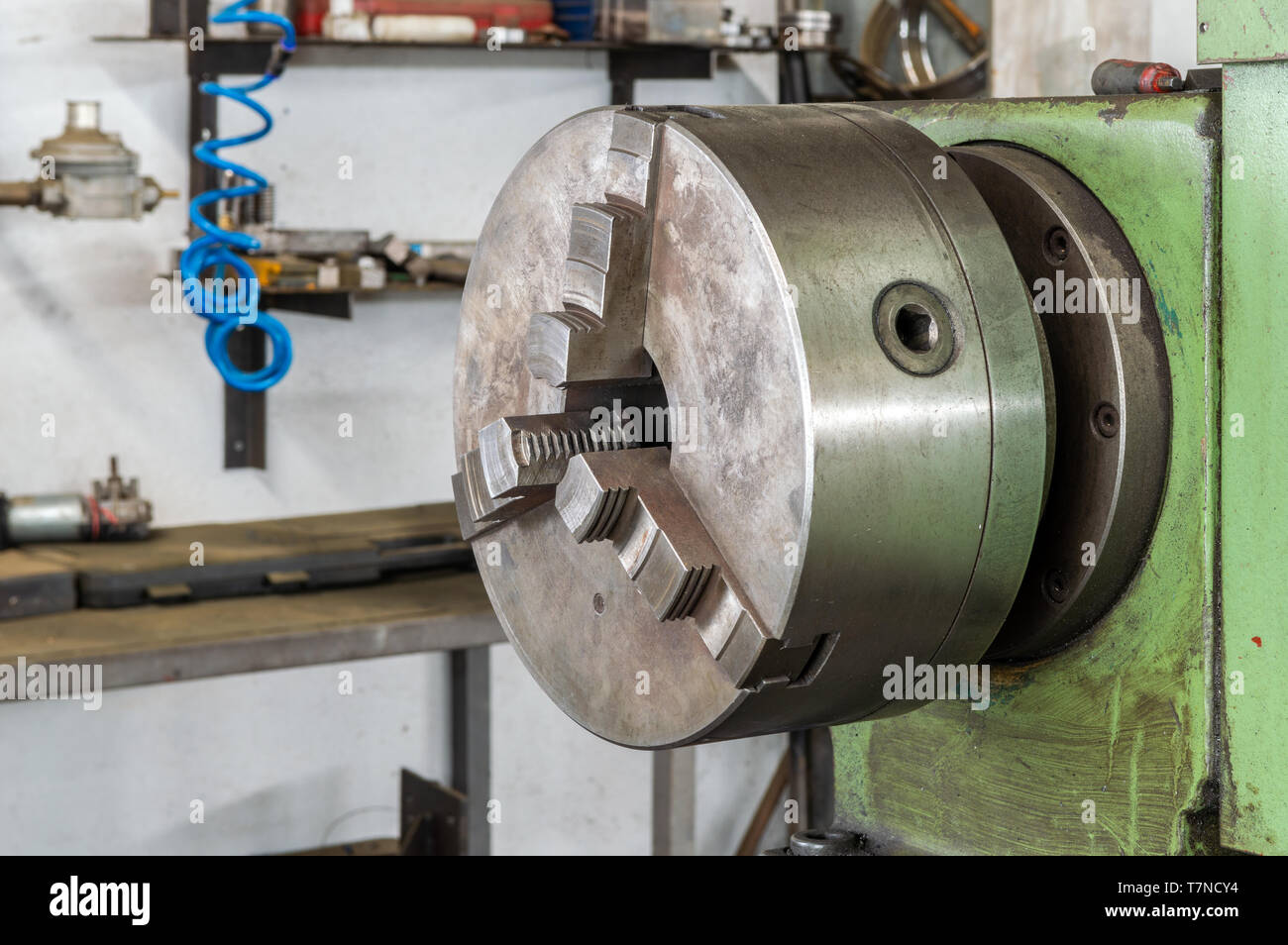 Close up of a lathe grinding machine in a factory Stock Photo Alamy