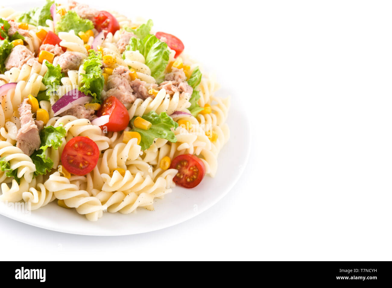 Pasta salad with vegetables isolated on white background Stock Photo