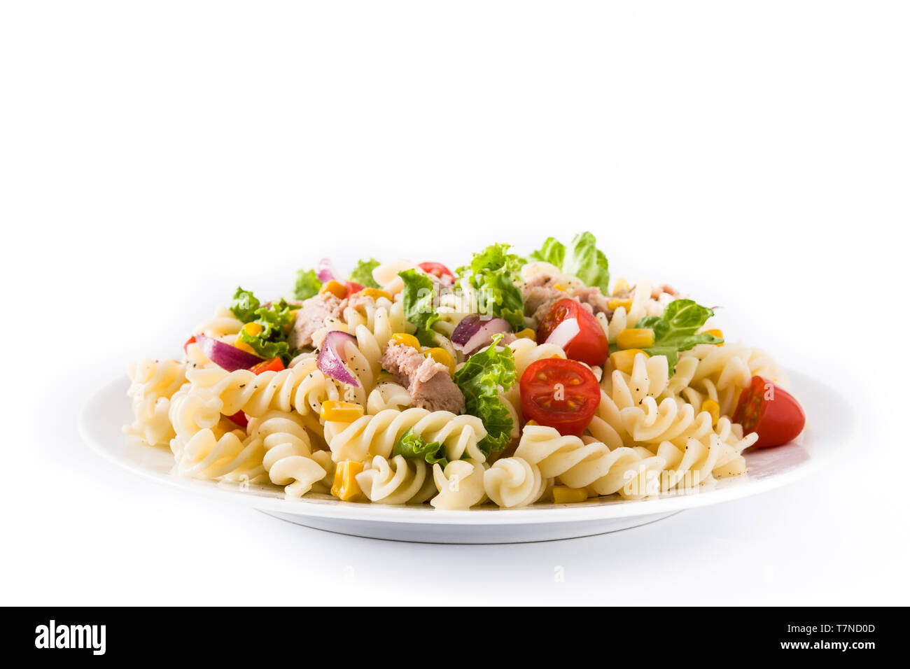 Pasta salad with vegetables isolated on white background Stock Photo