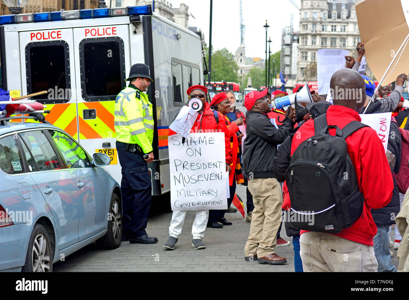 London, England, UK. Police interacting with protesters (against the Ugandan regime) in Westminster, May 2019 Stock Photo