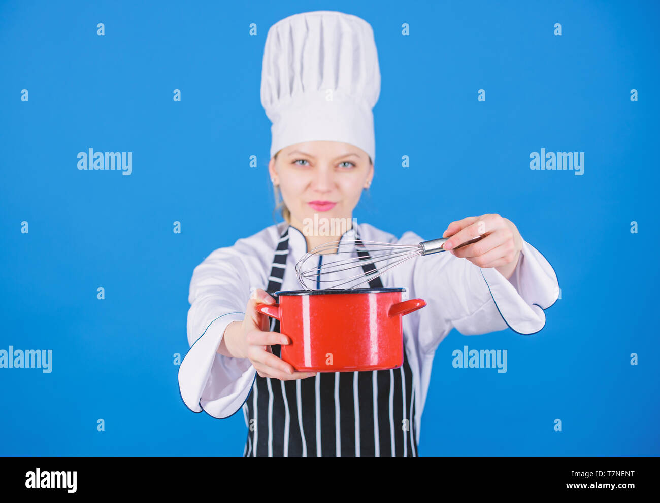 Start slowly whisking whipping or beating cream. Use hand whisk