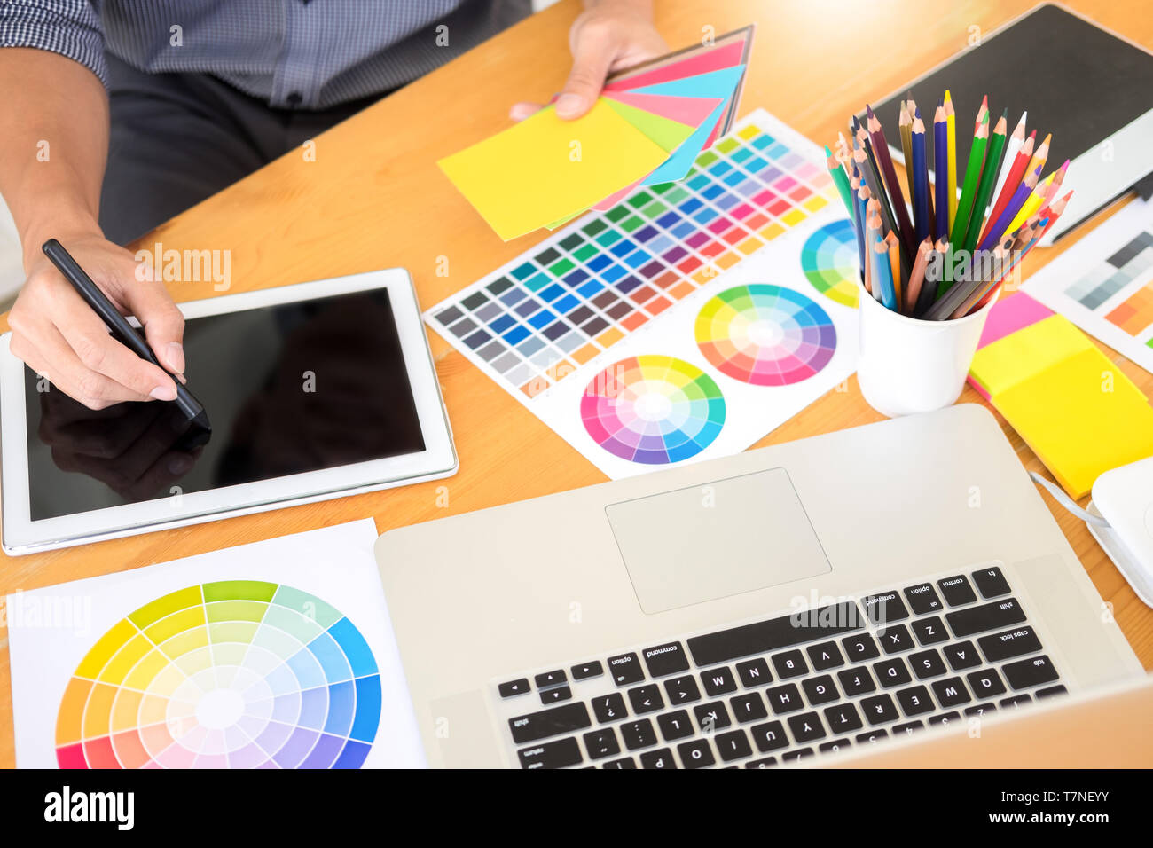 team interior designer drawing a new project using graphic computer and ...
