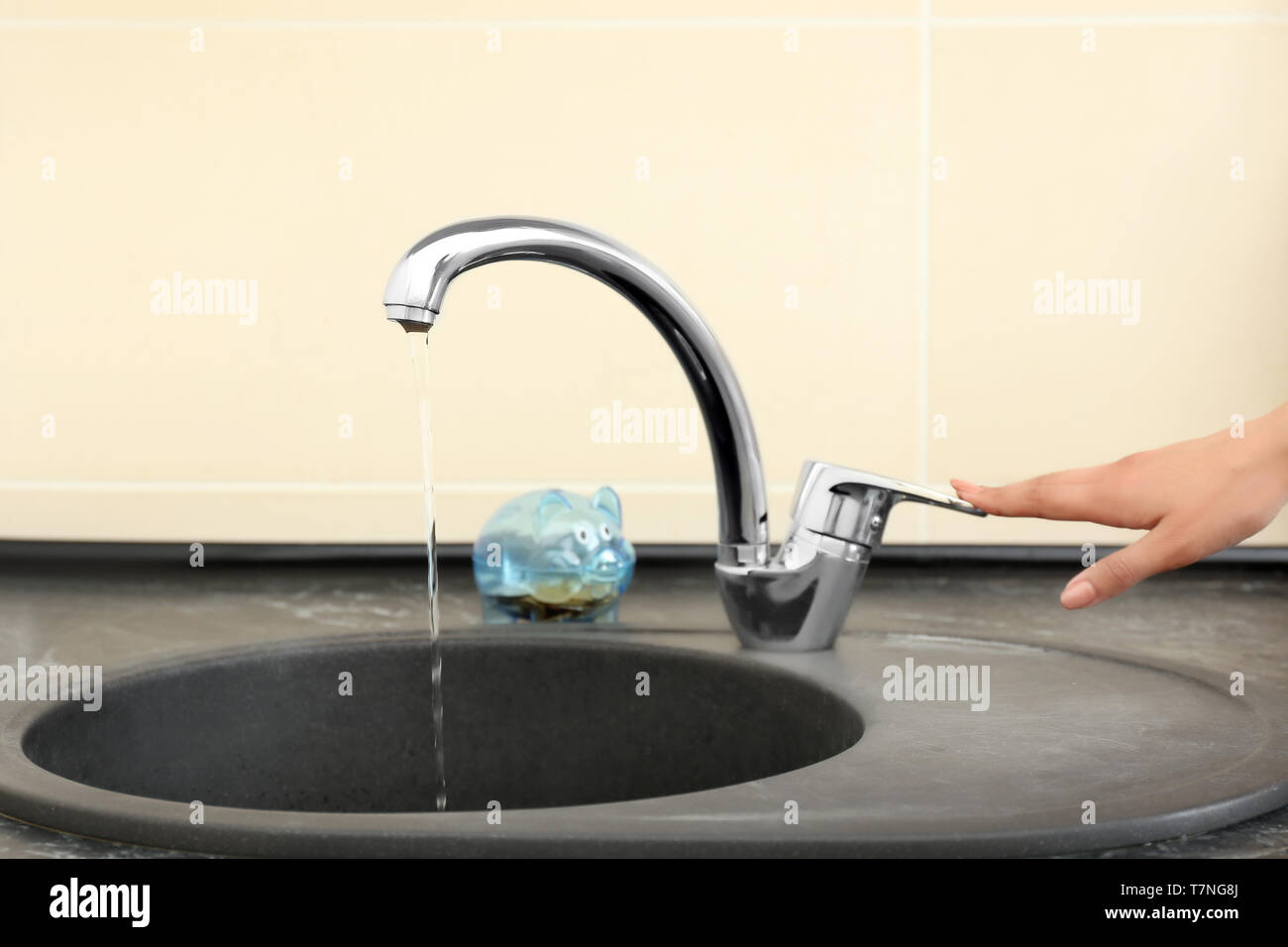 Hand turning tap off hires stock photography and images Alamy