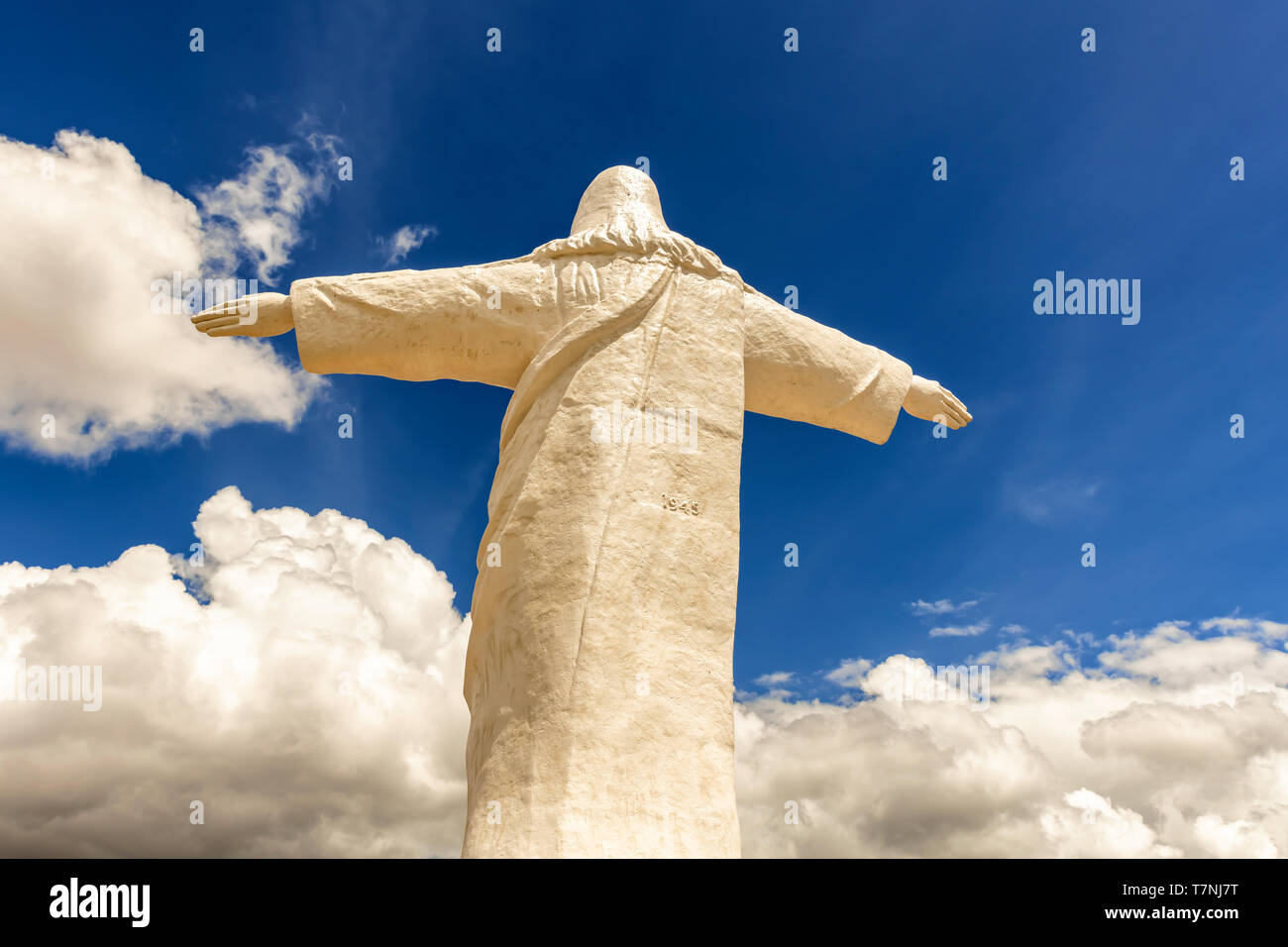 Statue of Cristo Blanco, White Christ. It is located on top of Red Hill,  Pukamuqu, at 3600m height and it is natural viewpoint of the Cusco city in  Pe Stock Photo -