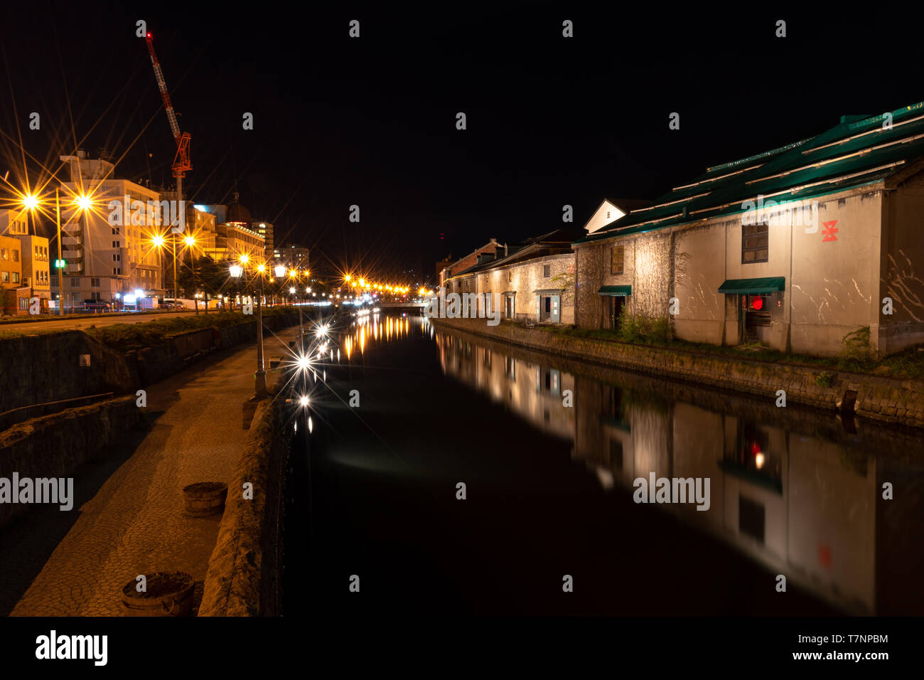 Landscape view of Otaru canals and warehouse at night in Hokkaido Japan. Here is a famous landmark of Otaru city. Stock Photo