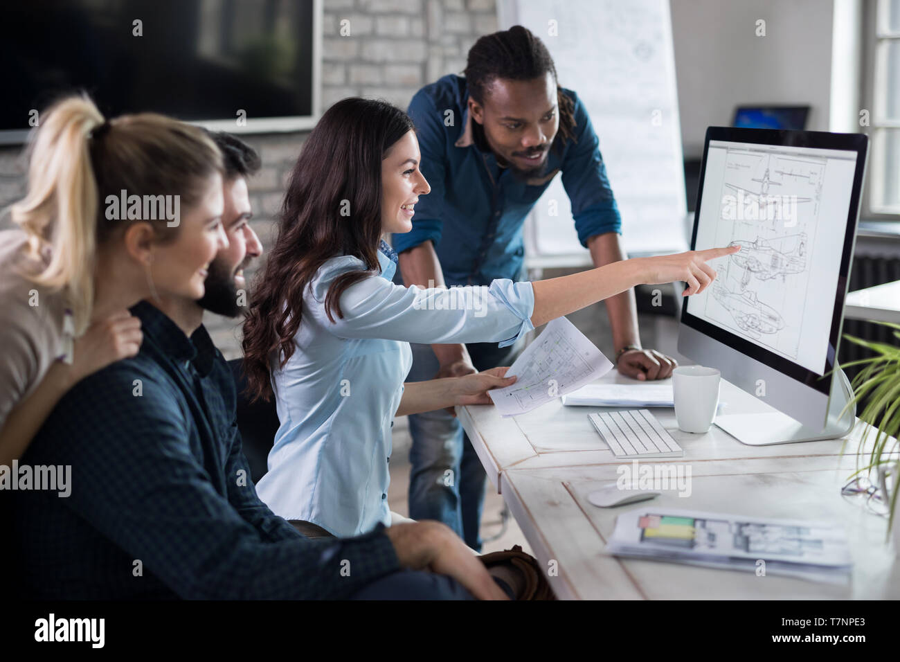 Young architects working on project in office Stock Photo