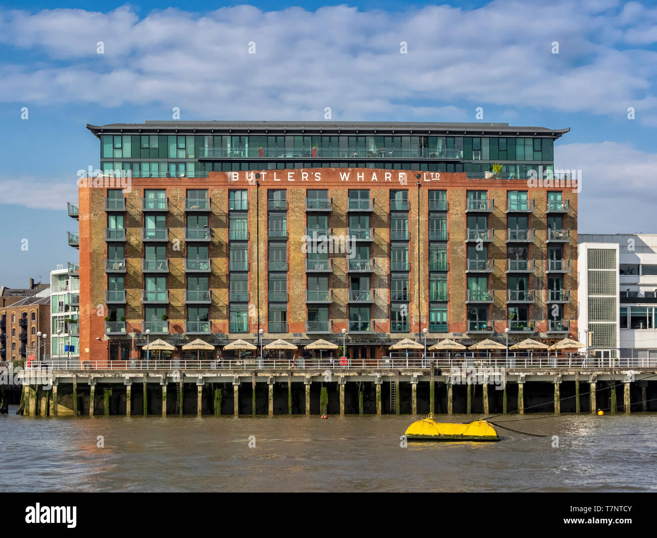 LONDON, UK - JULY 04, 2018:  Butlers Wharf building, converted to shops and housing, seen from the River Thames Stock Photo