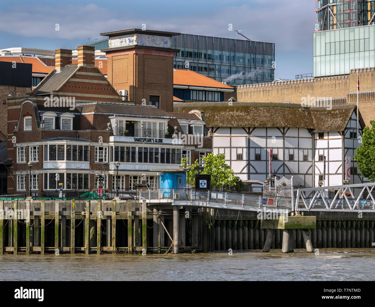 LONDON, UK - JULY 04, 2018:  Shakespeare's Globe Theatre and surrounding buildings seen from the River Thames Stock Photo