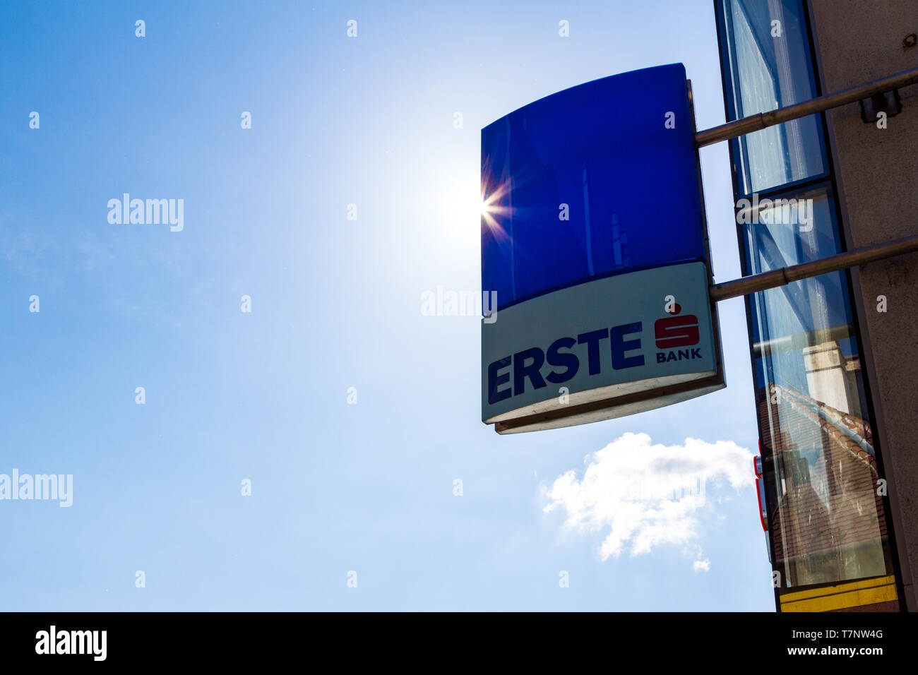 Erste Bank trade sign logo backlit against blue sky Stock Photo