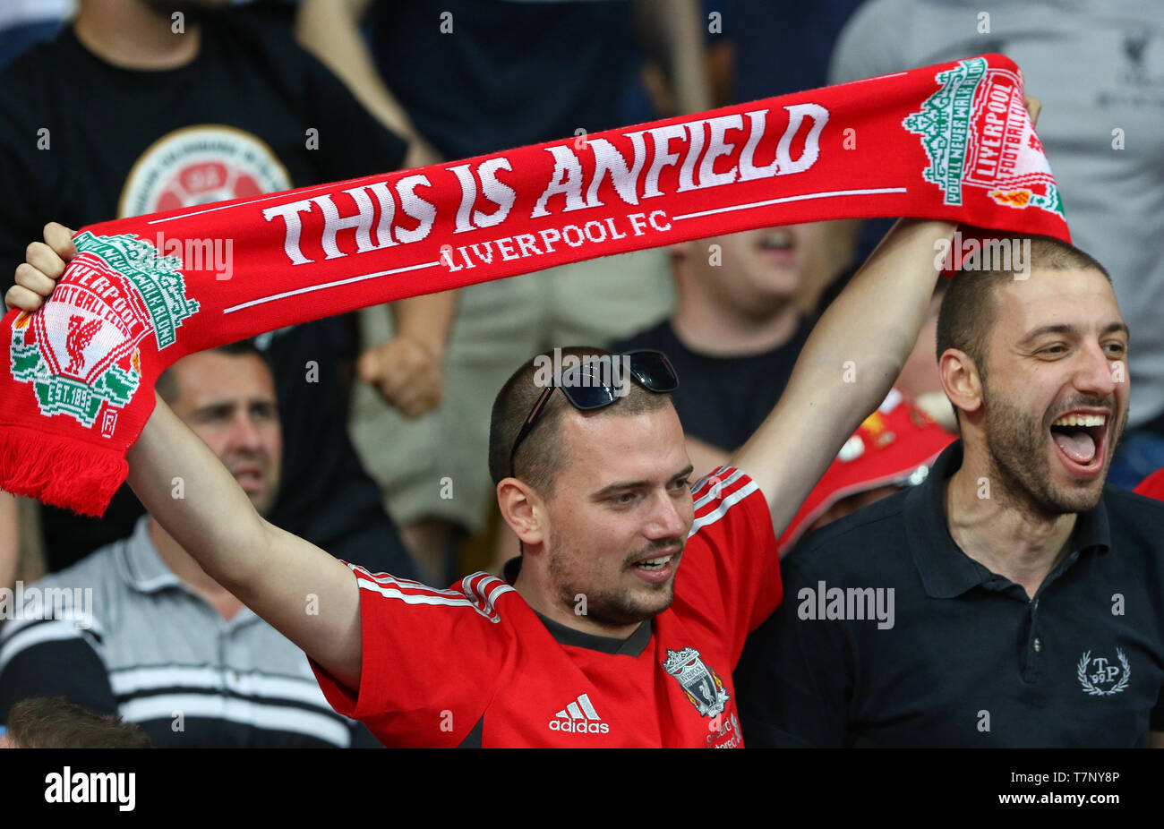 Liverpool supporter with This Is Anfield scarf shows his support during the UEFA Champions League Final 2018 game against Real Madrid Stock Photo