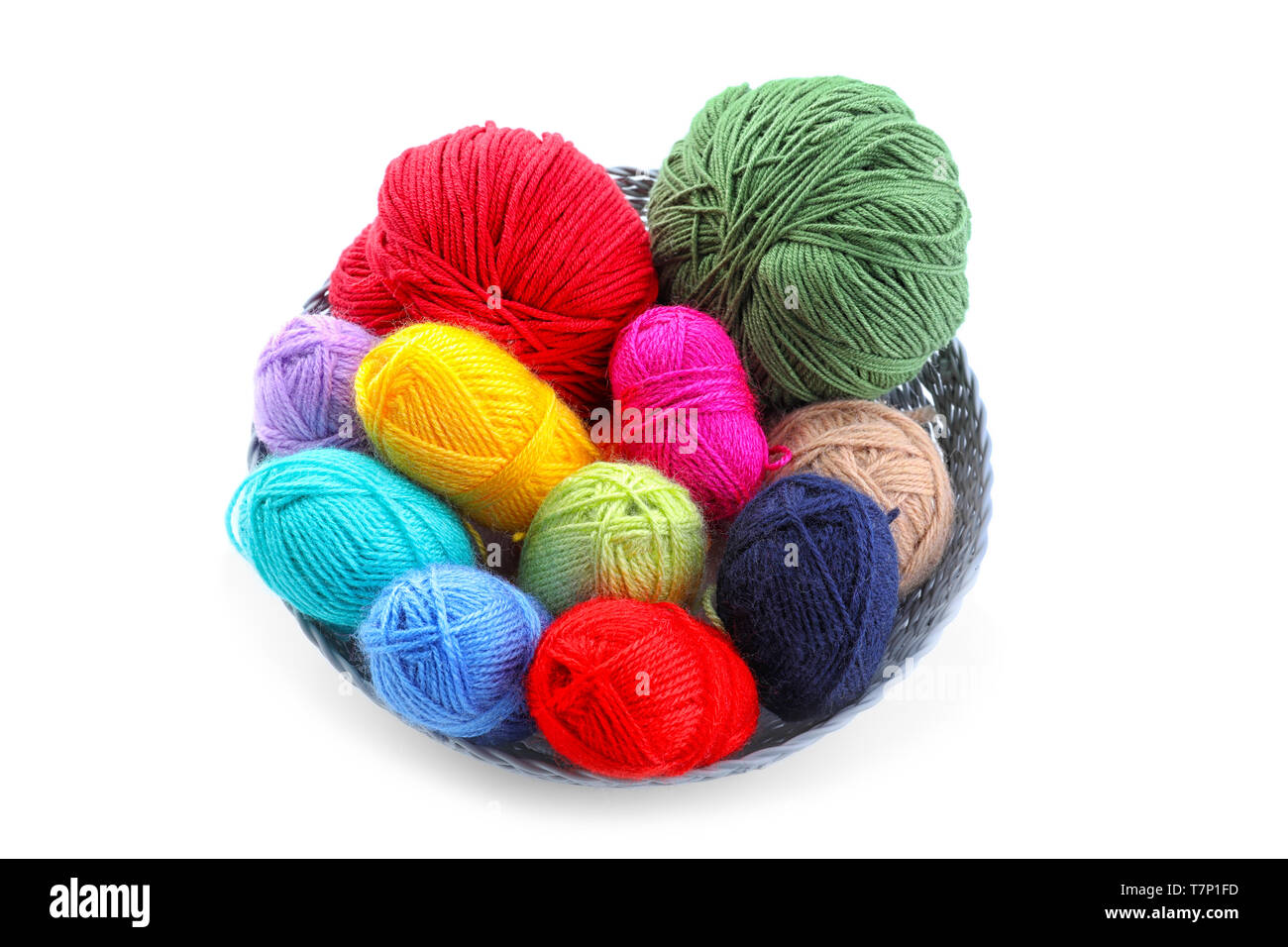 Basket with knitting yarn on white background Stock Photo - Alamy