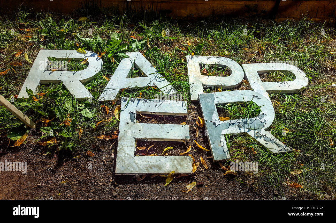 Letters of the word rapper posed in the grass Stock Photo