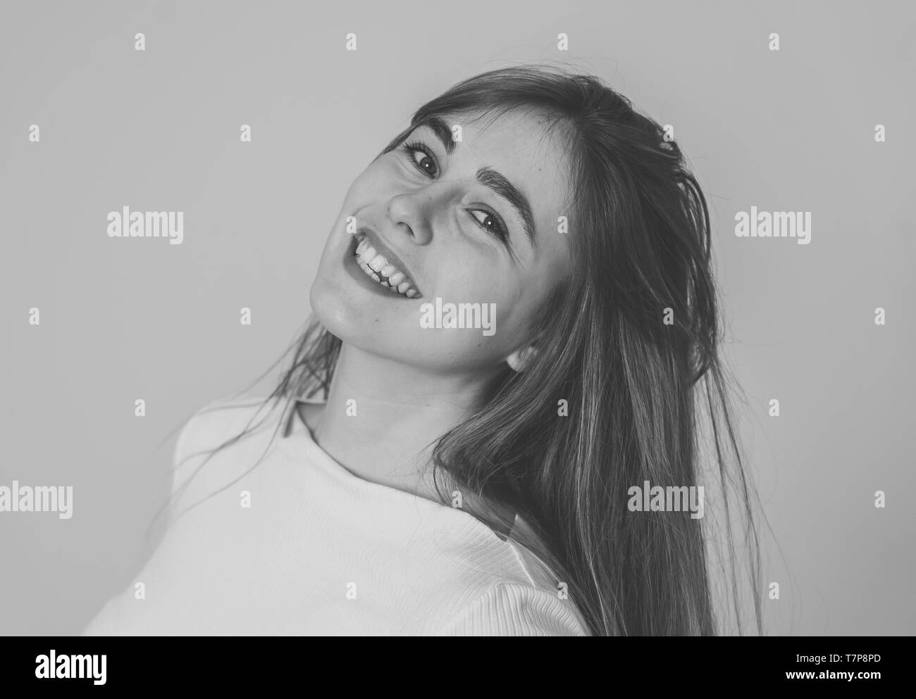 Portrait of cheerful young teenager woman with happy face smiling ...