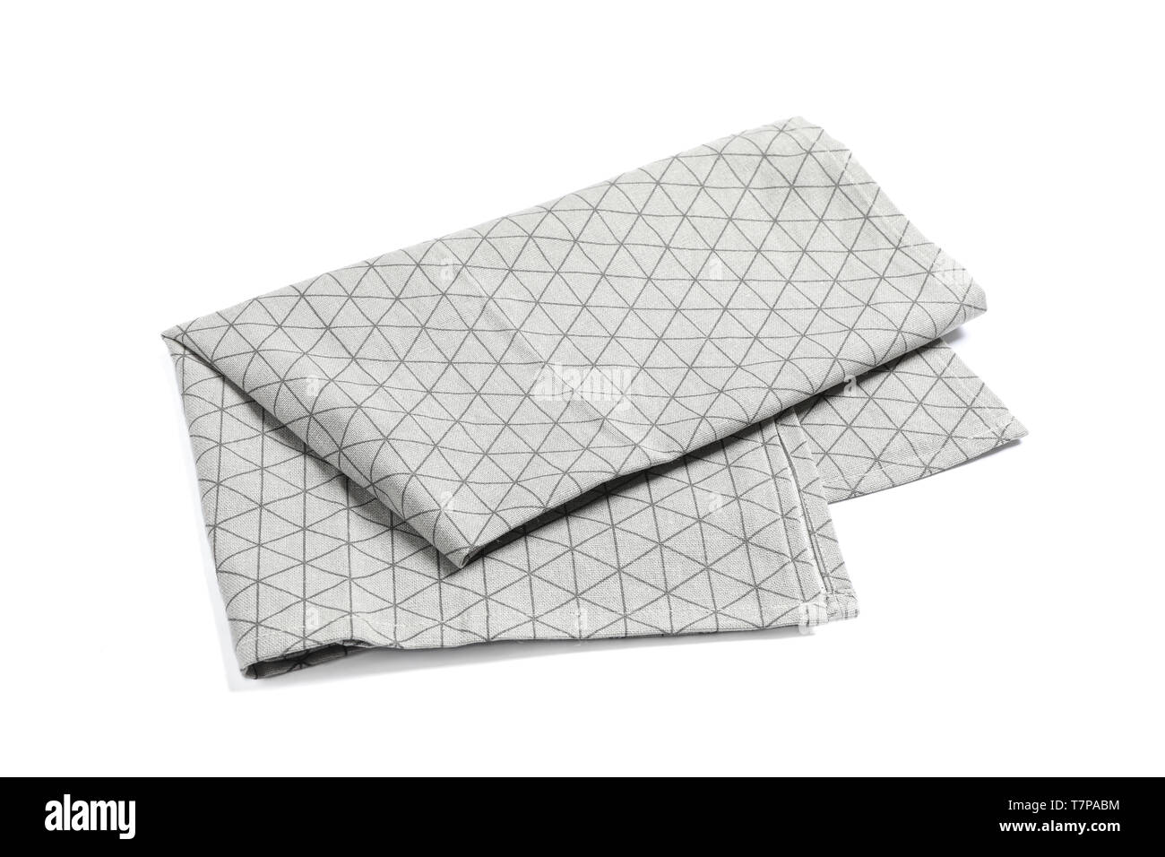 Folded grey napkin isolated on white background Stock Photo