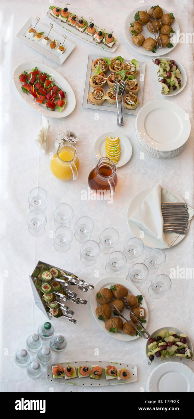 Food for a buffet on the table top view. Snacks. A festive table with  dishes and drinks Stock Photo - Alamy