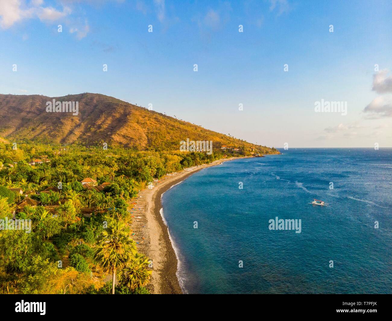 Indonesia, East Bali, Amlapura, Amed Coast, Banyuning Beach, Fishermen Return in Prahu (aerial view) Stock Photo