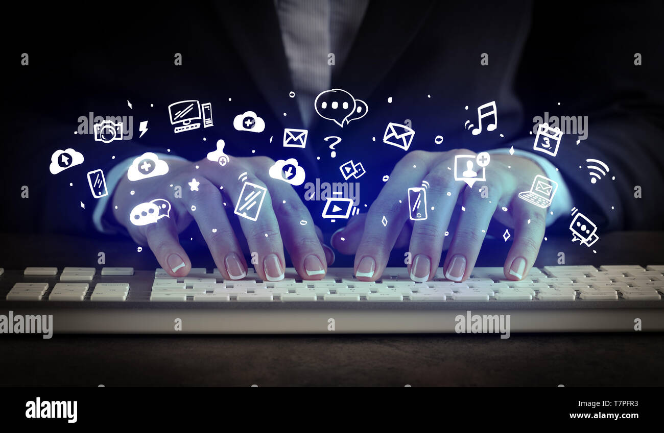 Blogger woman typing on keyboard with drawn application icons around ...