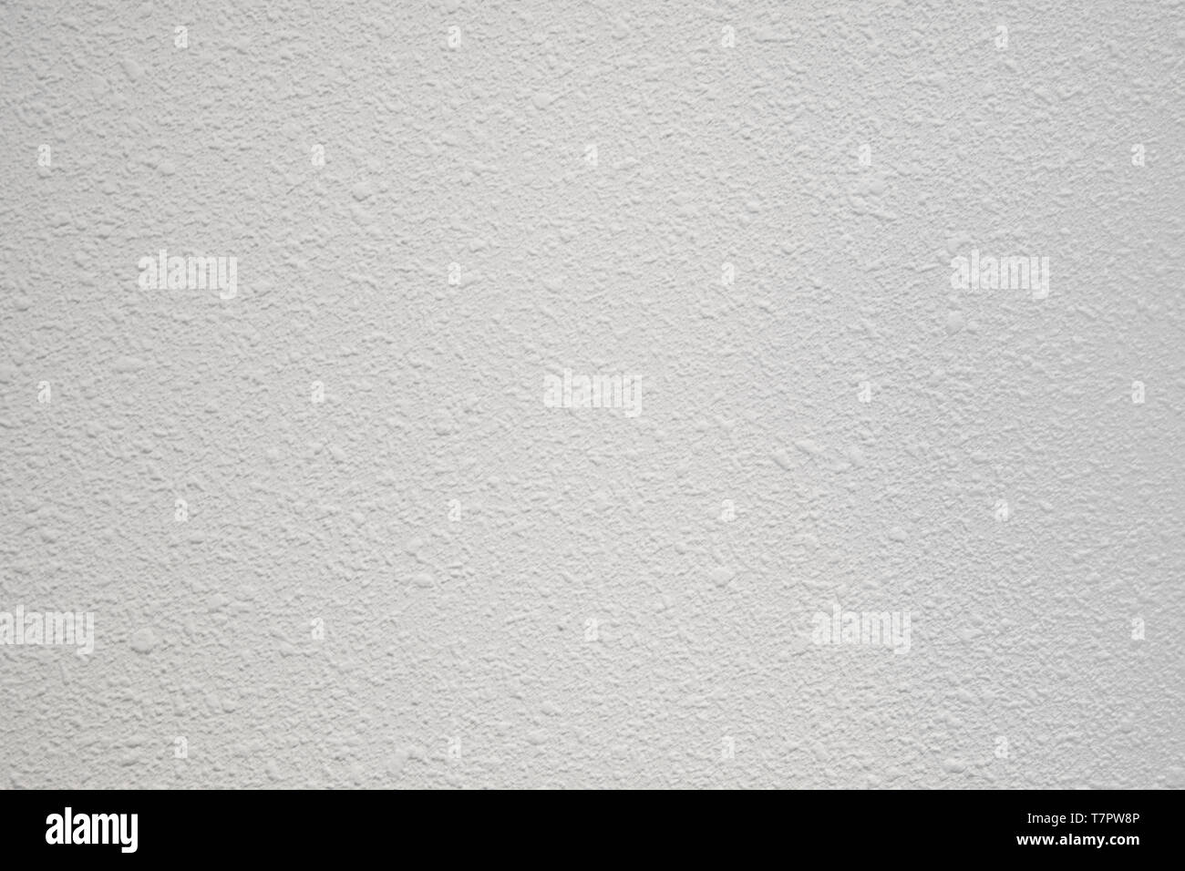 White color wallpaper with uneven falt skin texture Stock Photo