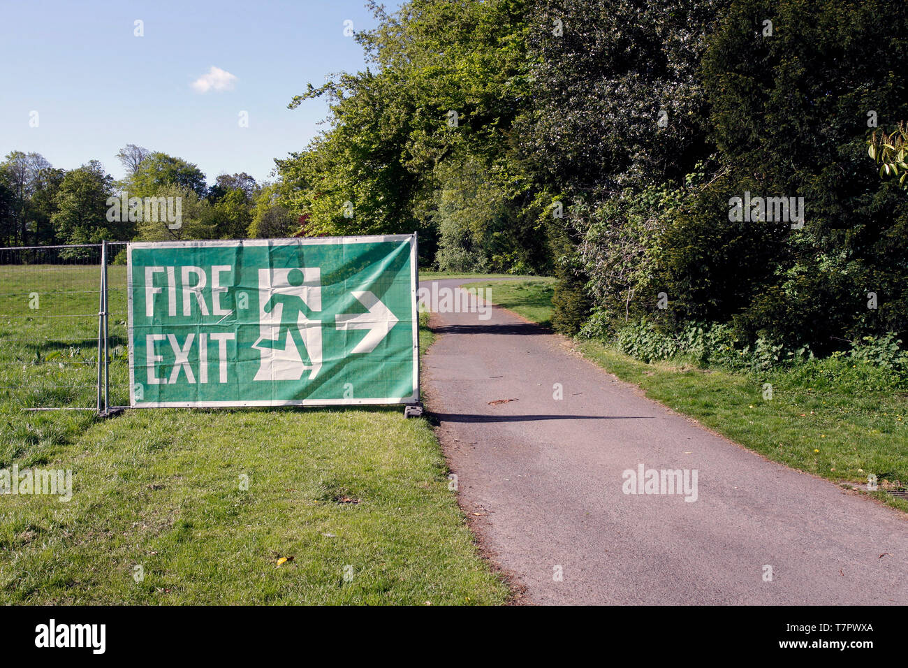 Outdoor Fire Exit sign in a forestry area Stock Photo