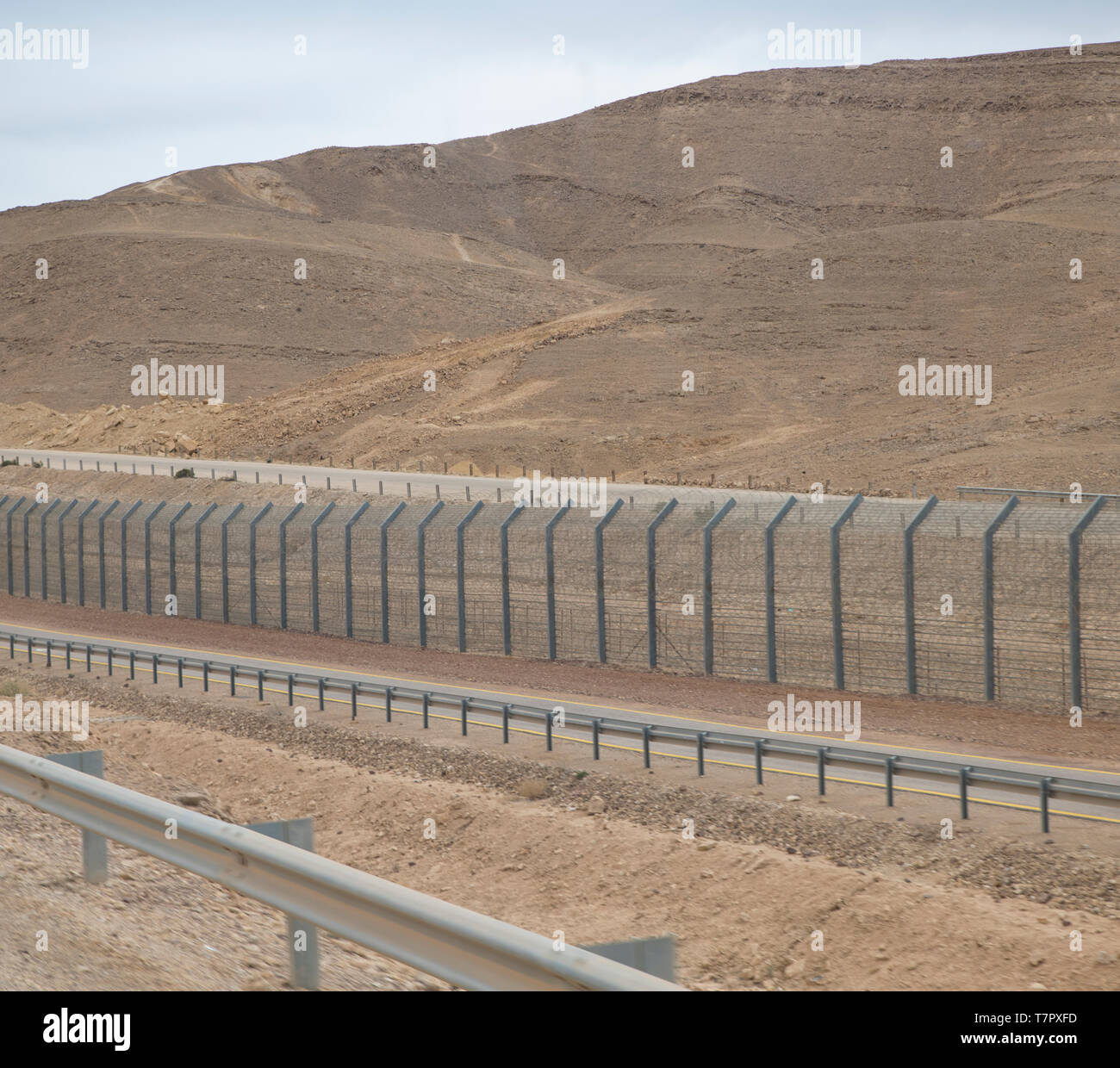 fence in the desert of south israel for protection of the land Stock Photo