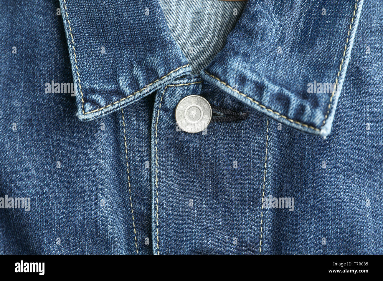 Denim jacket collar as background, place for text Stock Photo