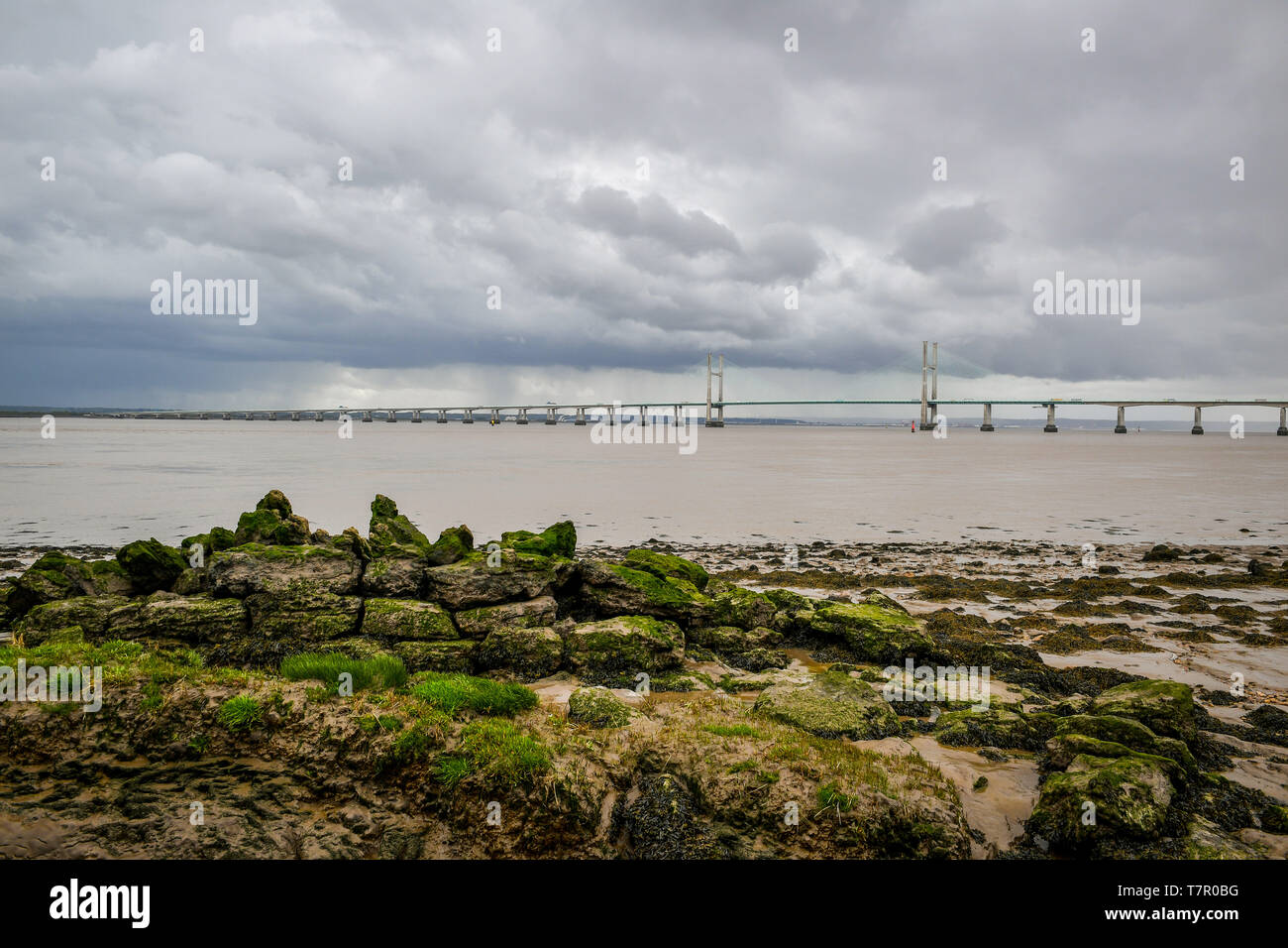 Storm clouds brood over the Prince of Wales Bridge in the Severn Estuary, as Britain is set to be hit with thunderstorms and heavy rain this week. Stock Photo