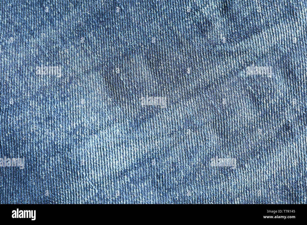 Texture of blue jeans as background, space for text Stock Photo