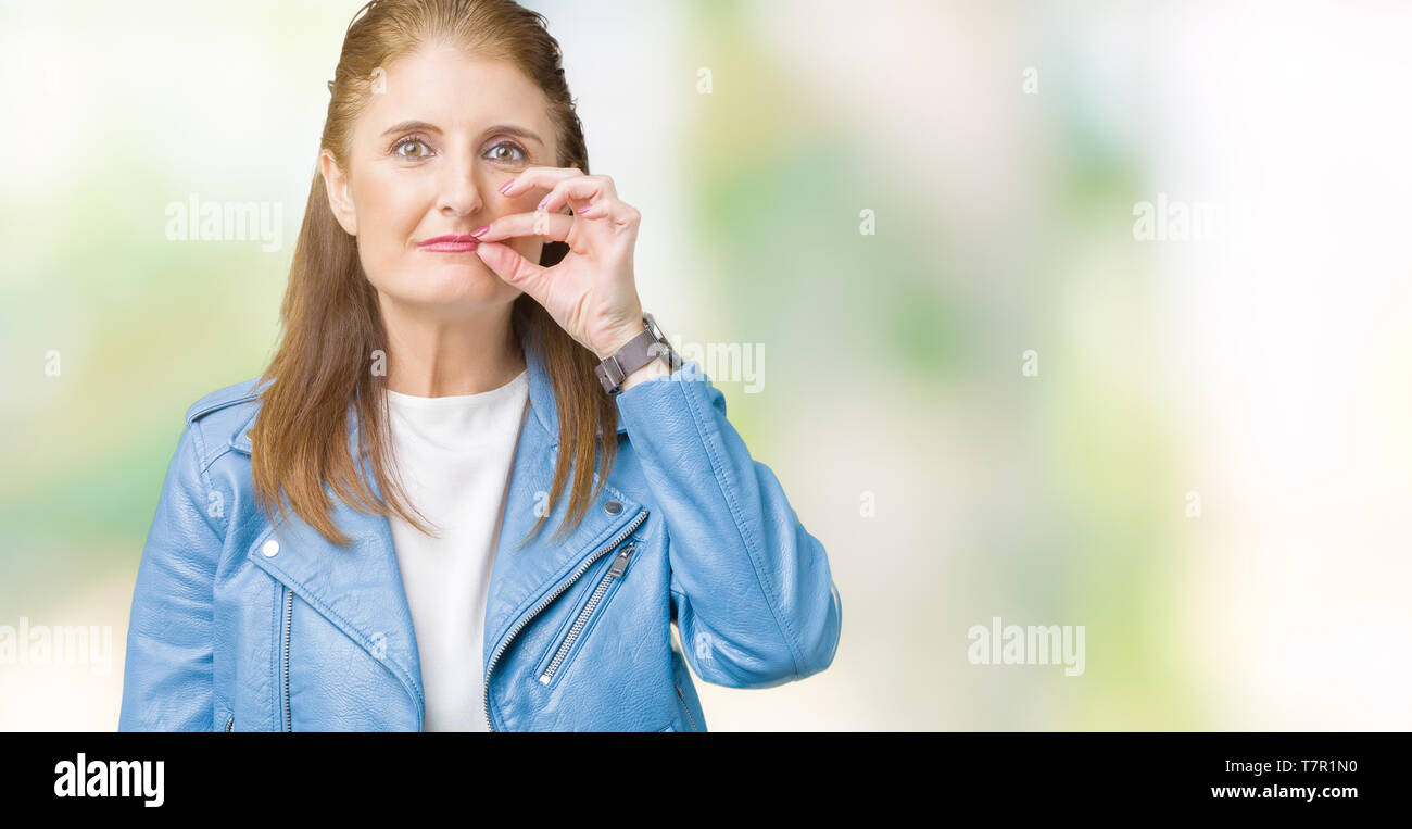 Beautiful Middle Age Mature Woman Wearing Fashion Leather Jacket Over