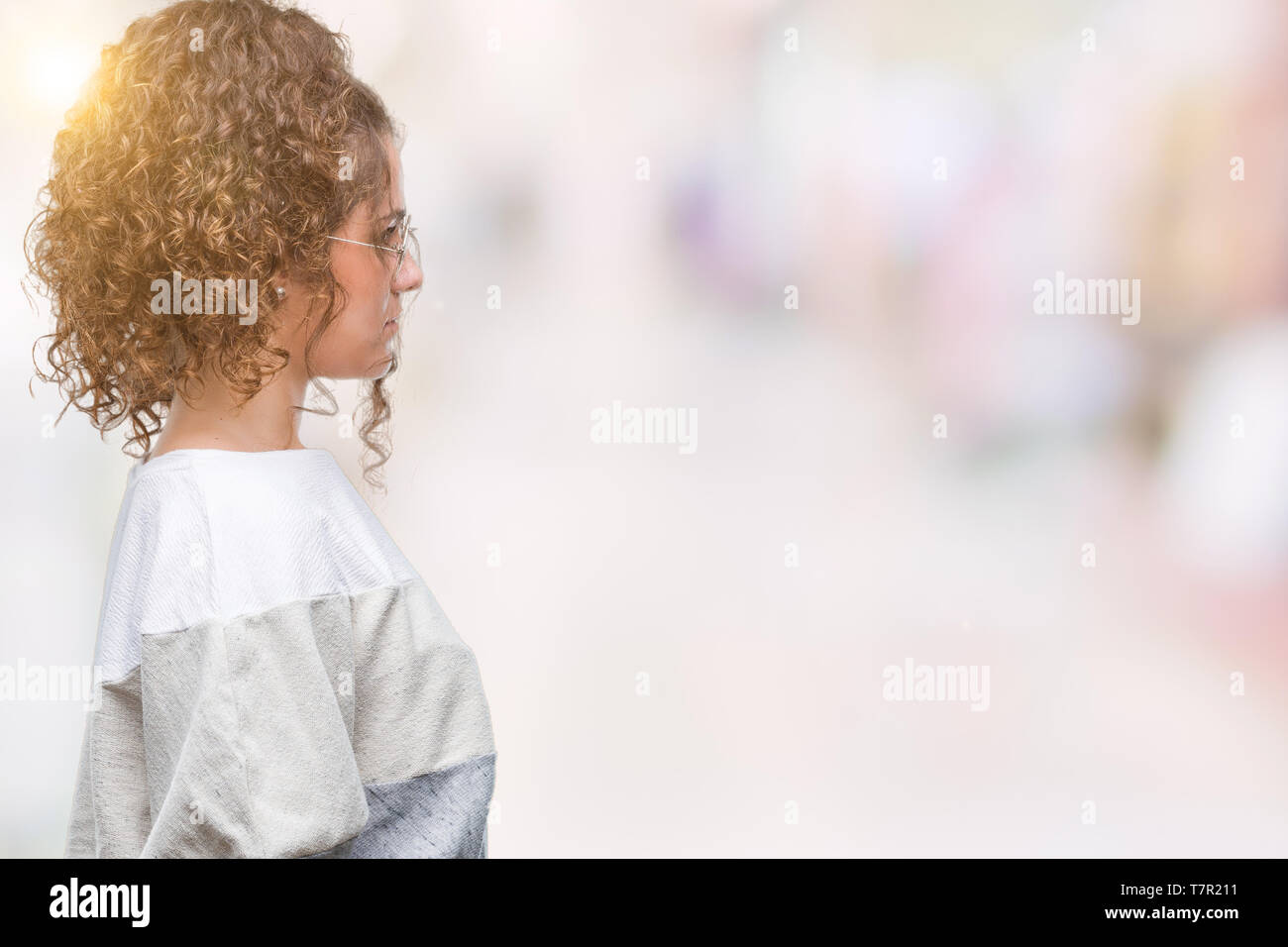 Beautiful Brunette Curly Hair Young Girl Wearing Glasses Over