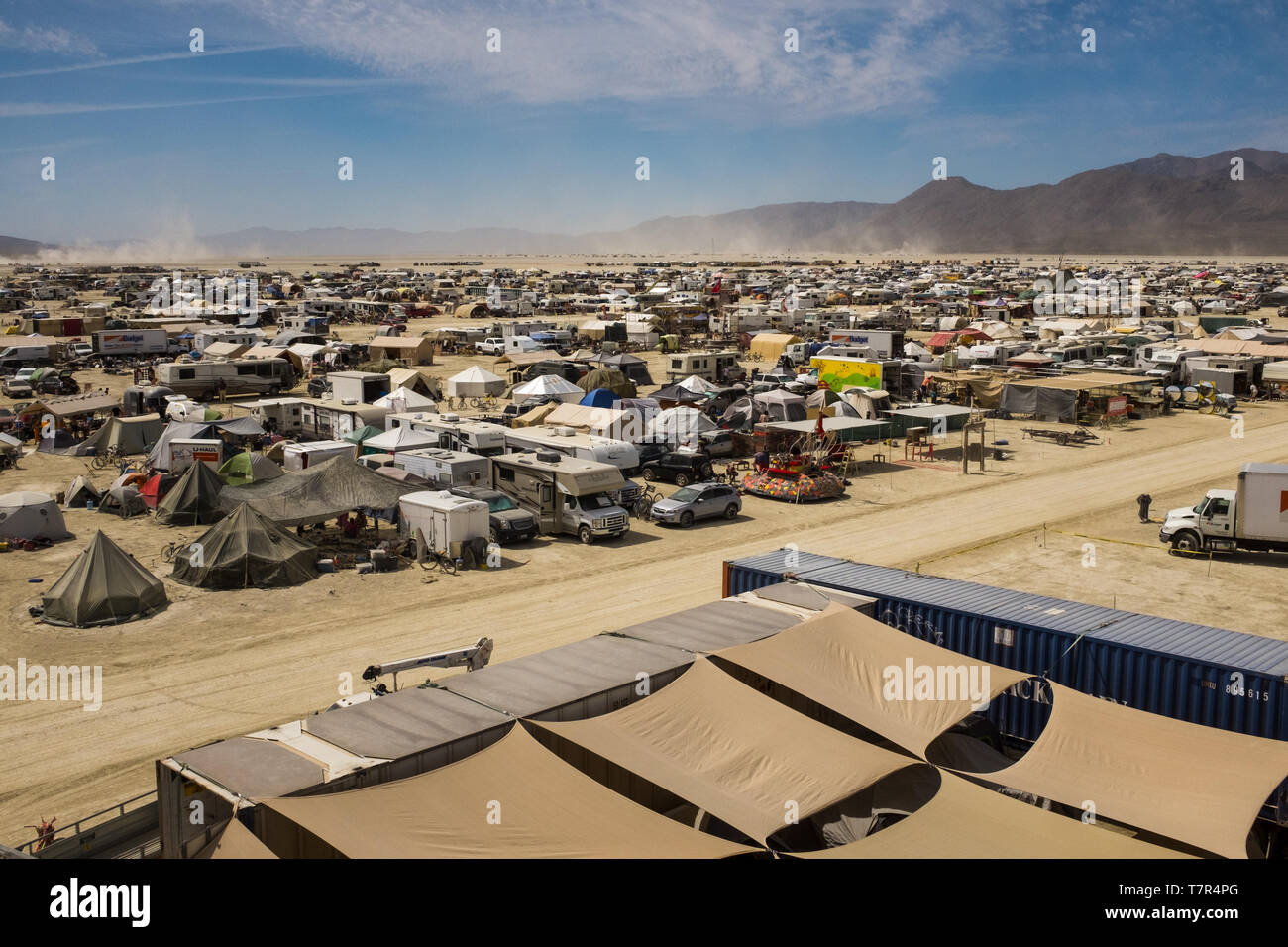 A view across the dust covered camps at Burning Man, almost looks like a refugee camp Stock Photo