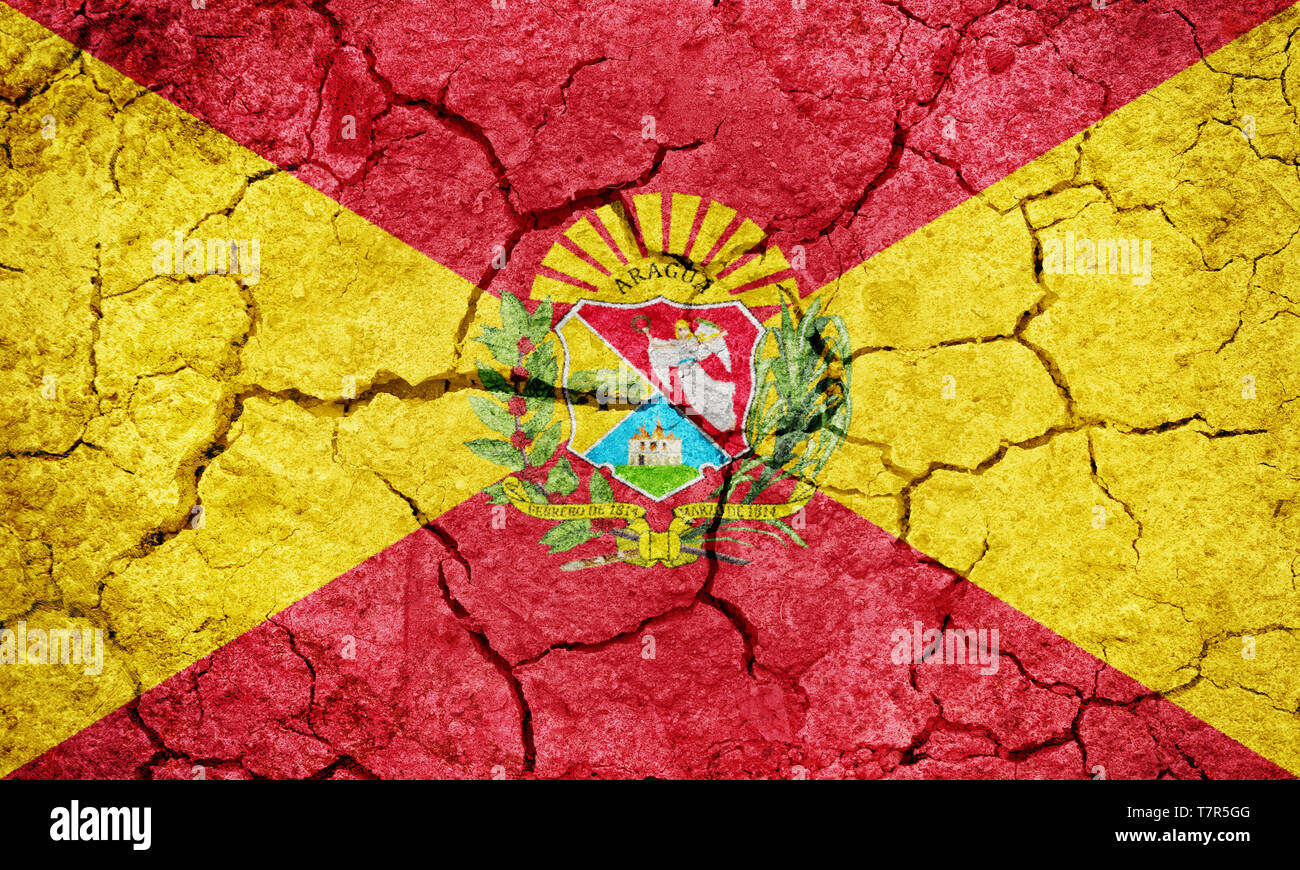 Aragua State flag, state of Venezuela, on dry earth ground texture ...