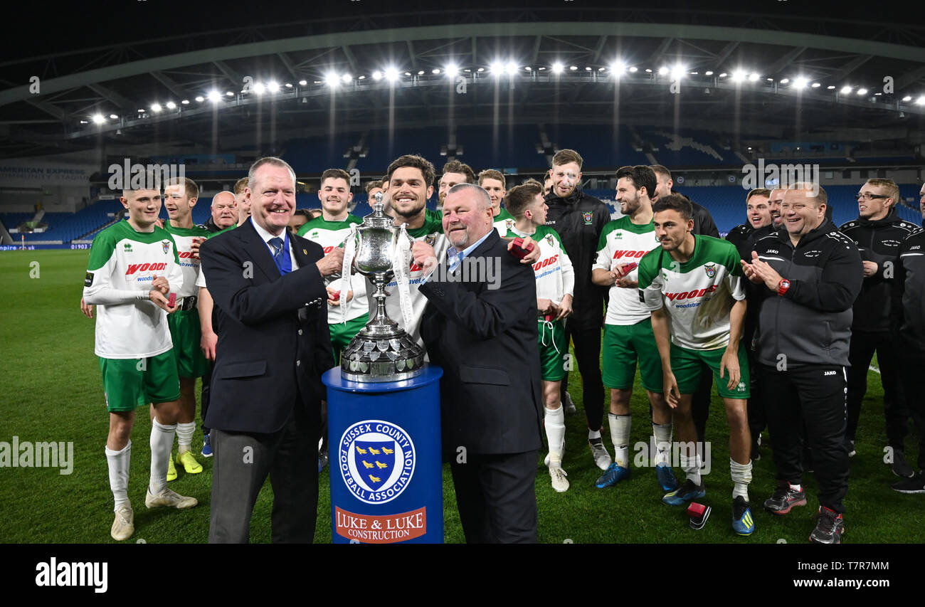 Bognor lift the trophy after winning the Sussex Senior Challenge Cup Final between Bognor Regis Town and Burgess Hill Town at the Amex Stadium. Credit : Simon Dack Stock Photo