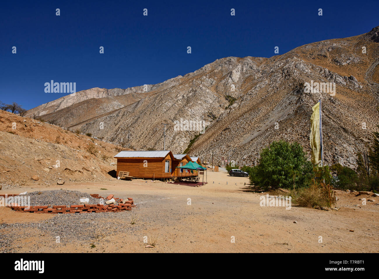Cochiguaz village is noted for New Age and also UFO sightings. Note the falling object in the photo above the tree! Elqui Valley, Chile Stock Photo