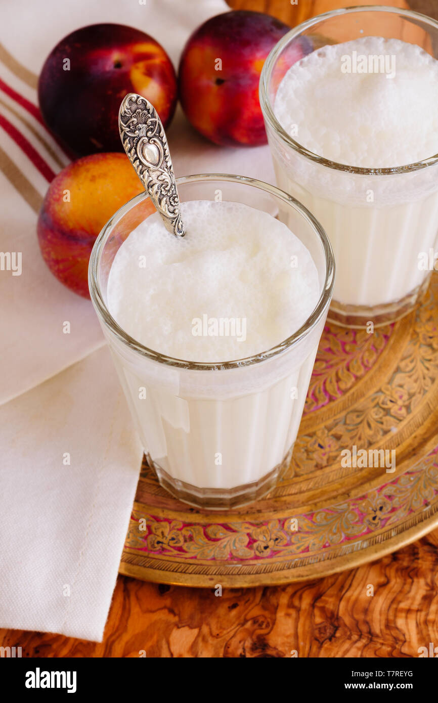 Ayran or Doogh a diluted yogurt drink made by mixing yogurt with iced water and is popular throughout the Middle East Stock Photo