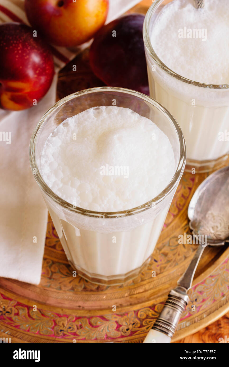 Ayran or Doogh a diluted dairy drink made by mixing yogurt with iced water and is popular throughout the Middle East Stock Photo