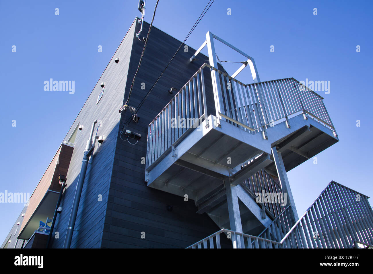 Japanese style building with stainless steel staircase, install outside the building. Stock Photo